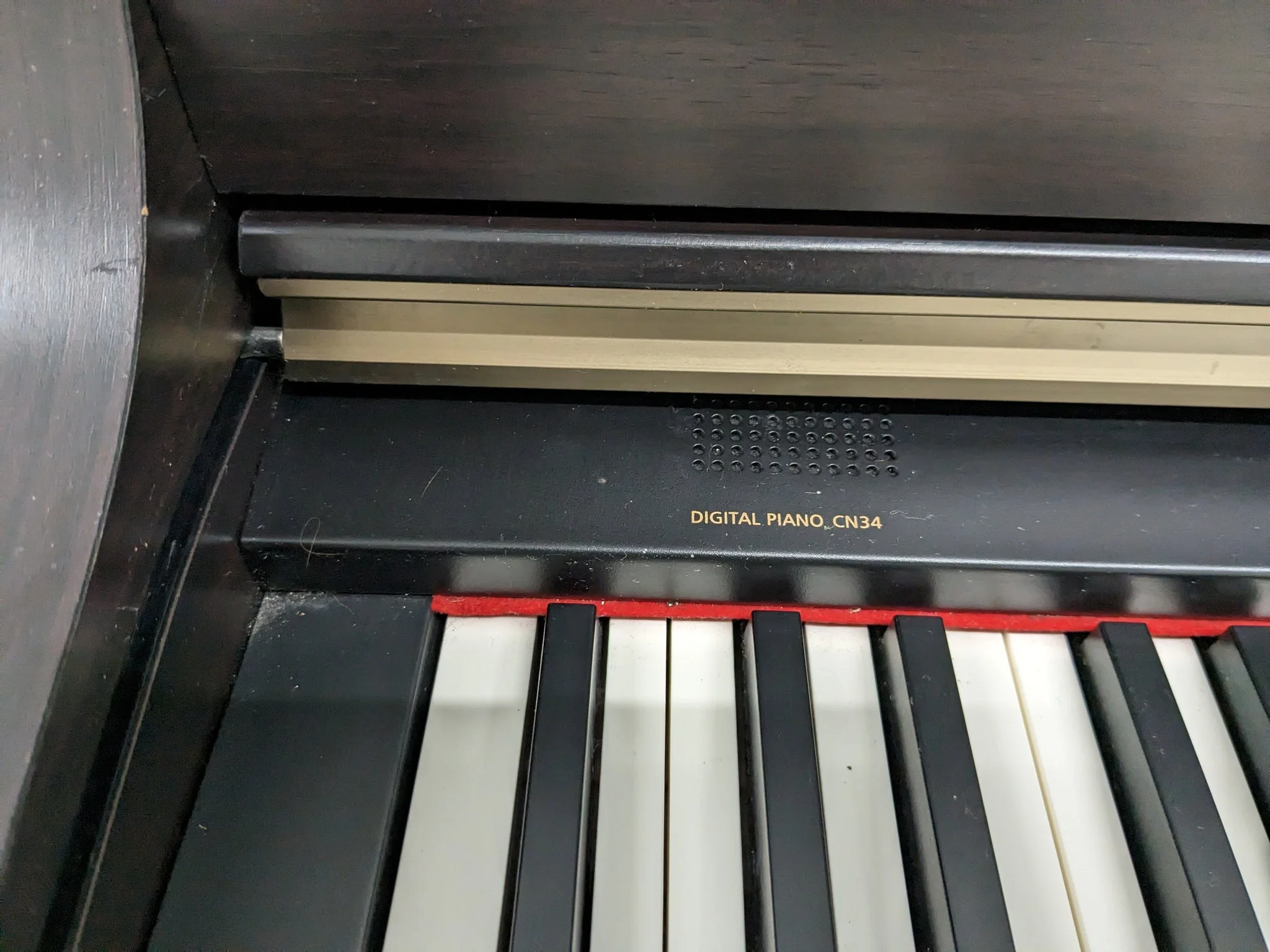 kawai-cn-34-piano-dien-cao-cap-phim-dan-chan-that-2